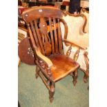19thC Elm seated Elbow chair with turned supports