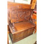 20thC Monks Bench with Lion handles and panel front