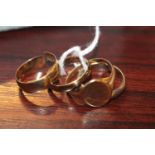 3 9ct Gold rings 7.5g total weight and a Silver Wedding band