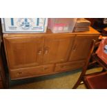 Ercol Blond Elm Sideboard of 3 Cupboards above drawer base