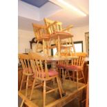 Pine Circular table and a set of 6 Pine Chairs with removable cushions