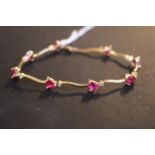 Ladies 10K Gold Ruby and Eight Cut Diamond Bracelet 5.7g total weight