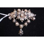 Interesting 19th Silver backed Diamond set Floral design brooch of 25 Facetted stones 32g total