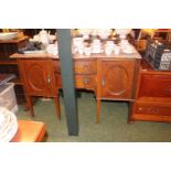 Serpentine Marble topped Edwardian Sideboard on tapering legs and Caster feet