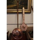 Pair of Copper embossed Bellows and a Copper warming pan