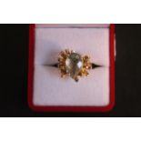 Interesting Ladies 14ct Gold Pear Shaped Prasiolite set ring with Explosion design. 9.2g total