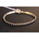 Ladies 9ct Gold Diamond Tennis Bracelet comprising of forty eight semi facetted diamonds 8.2g
