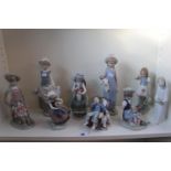 Collection of Lladro figurines inc. Flower Girl, Boy with rocking Horse etc (9)