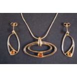 Ladies 9ct Gold Amber Earring and Pendant Suite on 9ct Gold Chain set with Cabochon Amber 10.7g