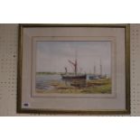 K Kernahan framed watercolour of boat in a Estuary