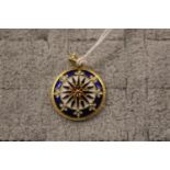 A Good Quality 18ct Gold enamelled circular pendant with hoop fitting 5.9g total weight