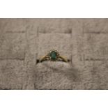 Ladies 9ct Gold Emerald and white stone set ring Size P 2g total weight