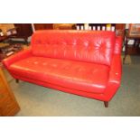 Good quality Red Leather button back sofa on wooden flared legs