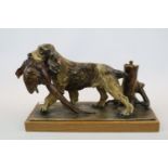 Cold Painted table lighter in the form of a Springer Spaniel with Pheasant in mouth mounted on