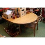 G Plan Oval extending dining table and a set of 6 chairs with upholstered seats and backs