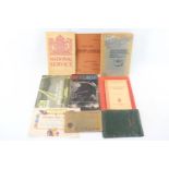 Wartime booklets including Britain's Home Guard, Fire Guards handbook, ration book cover etc