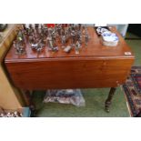 19thC Mahogany Pembroke table on turned legs with brass casters