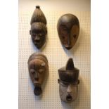 Collection of African Carved Tribal Masks of Nigerian and Central Africa origin 40cm - 35cm in size