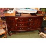 Edwardian Mahogany Sideboard of 3 drawers flanked by cupboard doors with brass drop handles