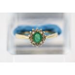 Ladies 9ct Gold Emerald and Diamond cluster ring Size P 2g total weight