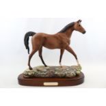 Royal Doulton 'The Champion' mounted on wooden base
