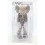 Small Lie Companion by KAWS (AKA Brian Donnelly, b1974). Created in 2017 this brown open edition