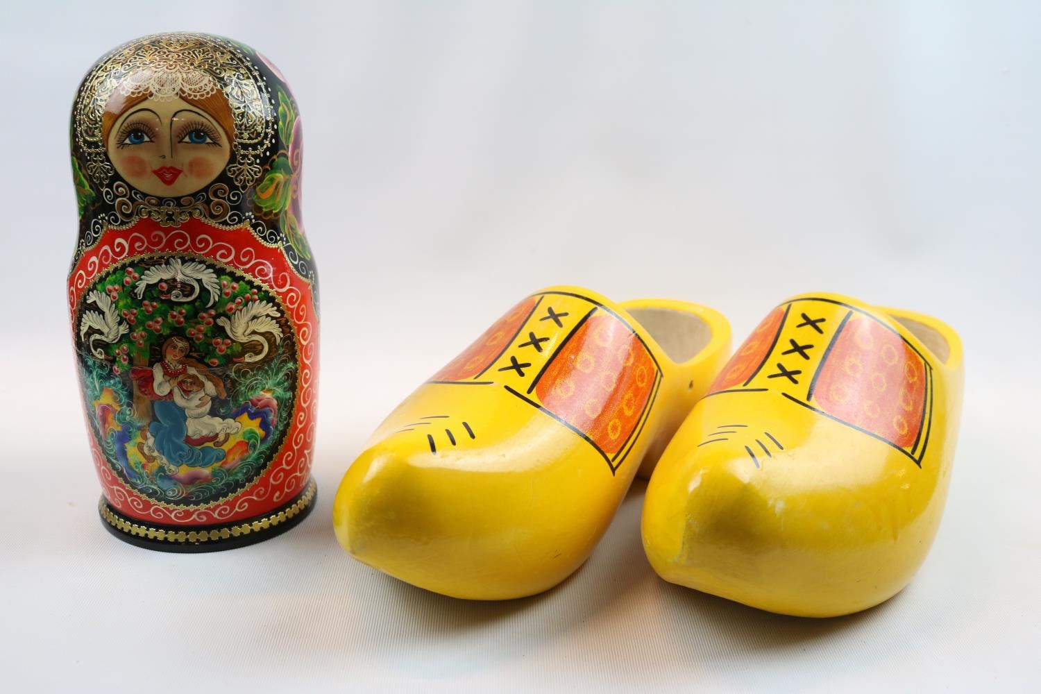 Pair of Hand Painted Clogs size 46 from Skinwood and a Russian Hand painted Doll