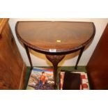 Demi Lune Hall table with glazed top over long pad feet