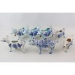 Collection of 7 Delft Cow Creamers inc. Royal Delft Example