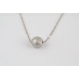 Ladies 18ct White Gold Diamond set spherical pendant on chain 2.5g total weight