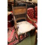 19thC Oak Elbow chair with inlaid floral design back on turned supports