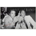 Black and white dual signed photograph by Sugar Ray Leonard and Thomas Hitman Hearns 5th King