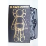 20th Anniversary Face Down Companion by KAWS (AKA Brian Donnelly, b1974). Created in 2020 this black