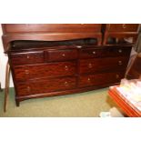 Stag Long Chest of 4 over 4 drawers with brass drop handles