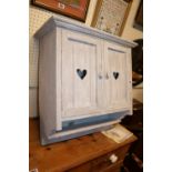 20thC Painted wall cupboard with pierced heart decoration