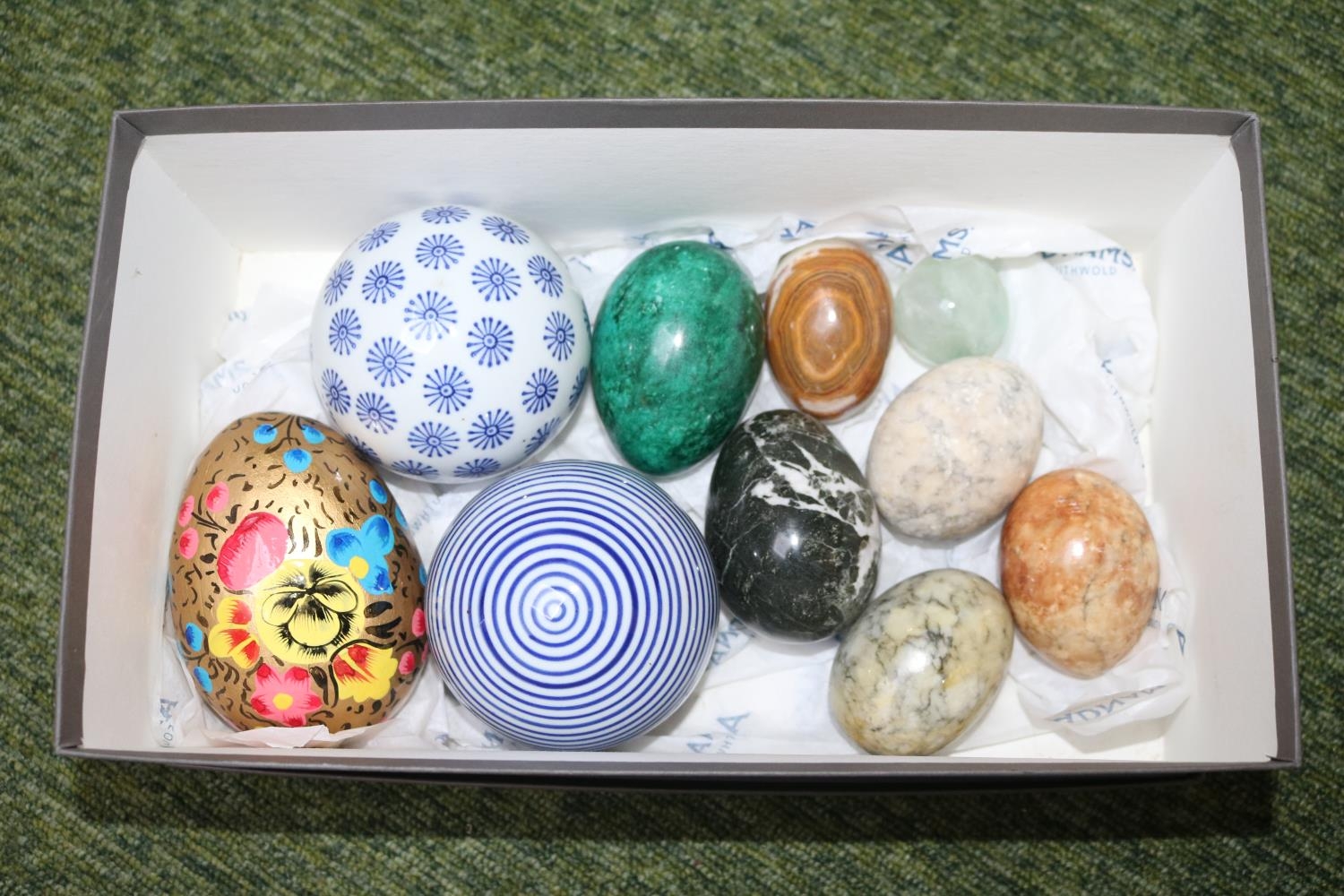 Box of assorted Polished stone eggs and Pottery balls