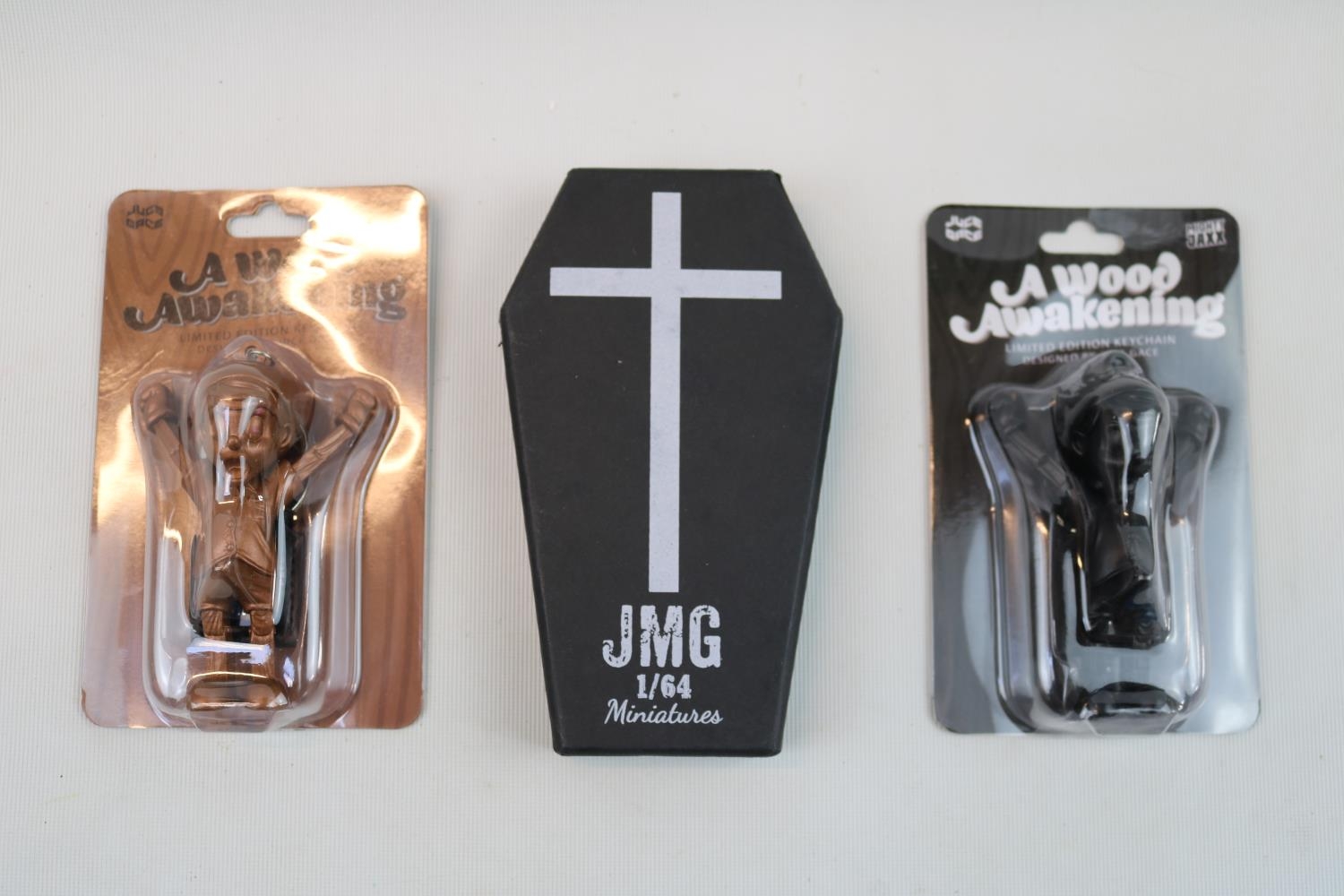 2 Juce Gace Mighty Jaxx A Wood Awakening Limited edition Keychain in Black and Rose Gold and a JMG