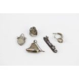 Collection of 5 Silver Charms of a Sailing Boat, French Horn, Fen Skate, Scent bottle and a Bird