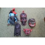 Collection of African and South Seas Tribal Masks and a Sri Lankan Puppet