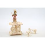 Prisoner of War Bone carved figure of a woman at a sewing loom. 9cm in Height