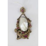 19thC Cherub decorated Ruby set pendant with baroque shell