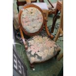 Victorian Walnut nursing chair with upholstered button back and turned supports