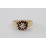 Ladies 18ct Gold Ruby & Diamond set cluster ring Size L. 3.8g total weight