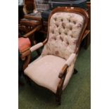 Victorian Button back chair with scroll arms and upholstered seat