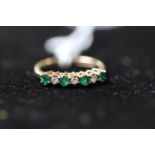 Ladies 9ct Gold Emerald and White Stone set ring Size K. 1.7g total weight