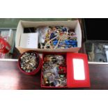 Shoebox of assorted Costume jewellery inc. Brooches, earrings etc