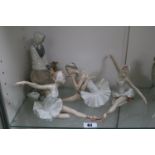 3 Lladro Ballerinas and a Lladro figure of a seated woman