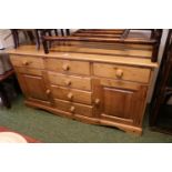 Pine Panelled sideboard with 4 drawers and turned handles