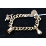 Ladies 9ct Gold Charm bracelet 42g total weight