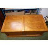 Good quality Oak coffee table with ottoman interior